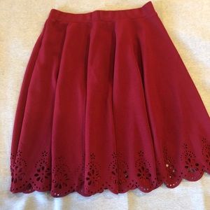 Red, scalloped skirt